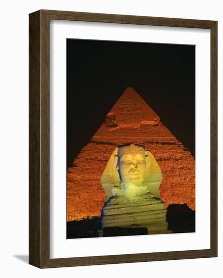 Sphinx and One of the Pyramids Illuminated at Night, Giza, Cairo, Egypt-Nigel Francis-Framed Photographic Print