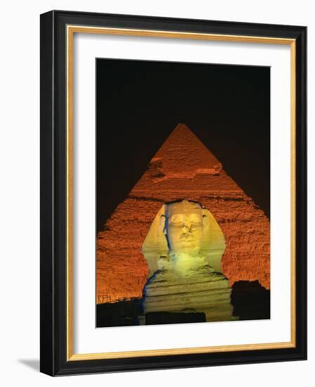 Sphinx and One of the Pyramids Illuminated at Night, Giza, Cairo, Egypt-Nigel Francis-Framed Photographic Print