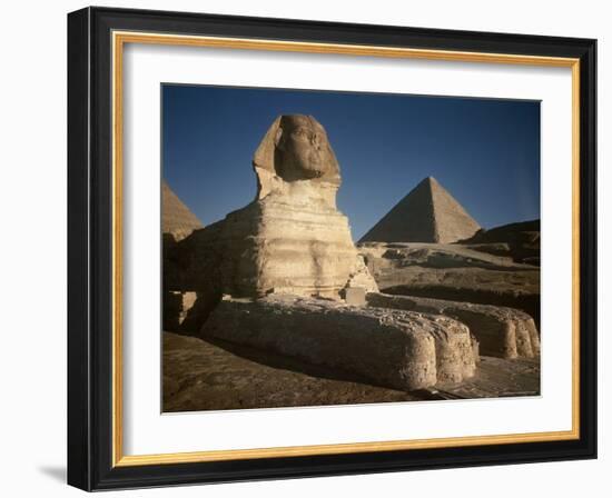 Sphinx with Great Pyramid in Background-Eliot Elisofon-Framed Photographic Print