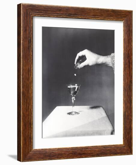 Spiking a Drink-null-Framed Photo