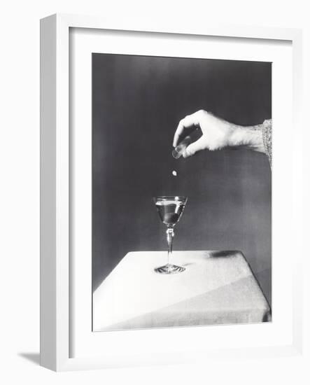 Spiking a Drink-null-Framed Photo