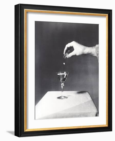 Spiking a Drink-null-Framed Photo