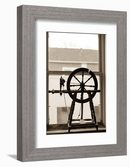 Spinning Wheel in a Window, Wilmington, Illinois, USA. Route 66-Julien McRoberts-Framed Photographic Print