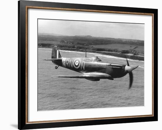 Spitfire in Flight-null-Framed Photographic Print