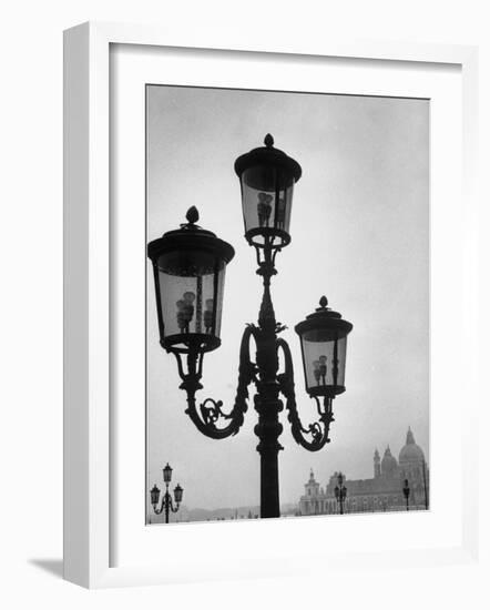 Splendor of a Street Light in the Piazza San Marco with the Santa Maria Della Salute Church-Dmitri Kessel-Framed Photographic Print