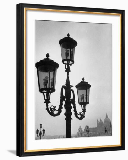 Splendor of a Street Light in the Piazza San Marco with the Santa Maria Della Salute Church-Dmitri Kessel-Framed Photographic Print