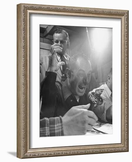 Sports Commentator William Stern Performing a Broadcast During a Football Game-null-Framed Photographic Print