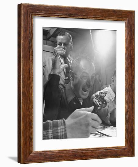 Sports Commentator William Stern Performing a Broadcast During a Football Game-null-Framed Photographic Print