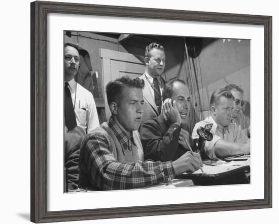 Sports Commentator William Stern Performing a Broadcast During a Football Game-null-Framed Photographic Print