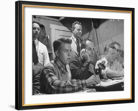 Sports Commentator William Stern Performing a Broadcast During a Football Game-null-Framed Photographic Print