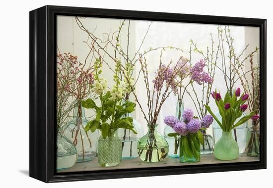 Spring Flowers in Glass Bottles III-Cora Niele-Framed Premier Image Canvas