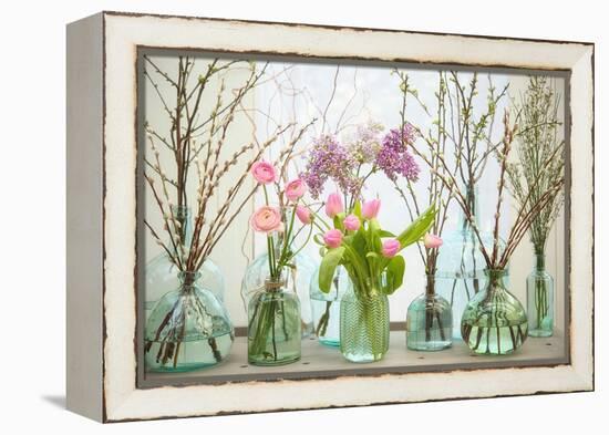 Spring Flowers in Glass Bottles VI-Cora Niele-Framed Premier Image Canvas