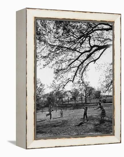 Springtime in Clarksville on a Farm with a Family Playing Baseball in the Yard-Yale Joel-Framed Premier Image Canvas