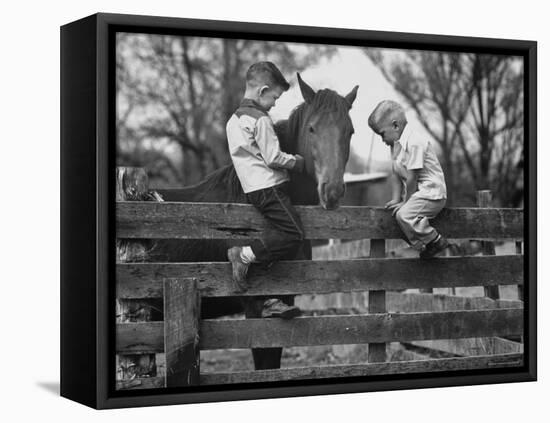 Springtime in Clarksville, with Two Kids and Their Pet Horse-Yale Joel-Framed Premier Image Canvas