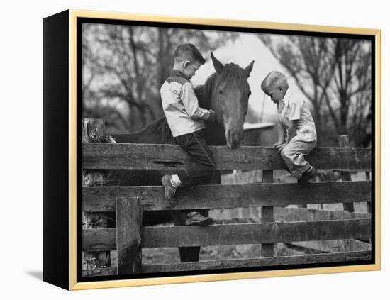 Springtime in Clarksville, with Two Kids and Their Pet Horse-Yale Joel-Framed Premier Image Canvas