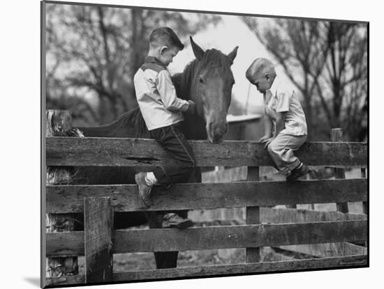 Springtime in Clarksville, with Two Kids and Their Pet Horse-Yale Joel-Mounted Photographic Print