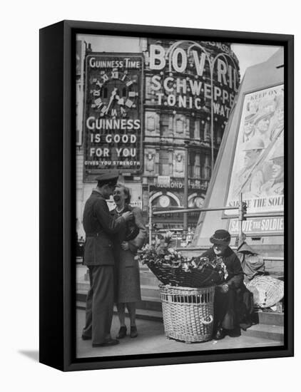 Springtime in England During WWII: Woman Selling Flowers in Circus Square-Ralph Morse-Framed Premier Image Canvas