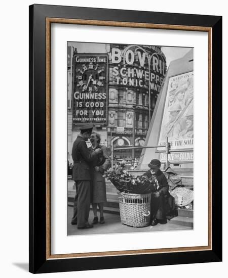 Springtime in England During WWII: Woman Selling Flowers in Circus Square-Ralph Morse-Framed Photographic Print