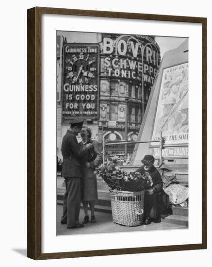 Springtime in England During WWII: Woman Selling Flowers in Circus Square-Ralph Morse-Framed Photographic Print