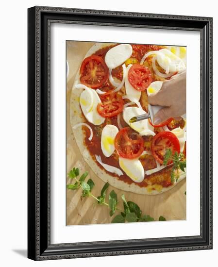 Sprinkling Pizza with Olive Oil-null-Framed Photographic Print