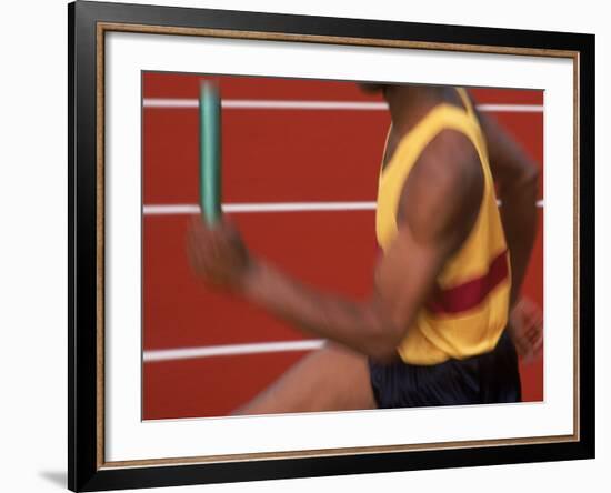 Sprinter Running with Baton-Peter Adams-Framed Photographic Print