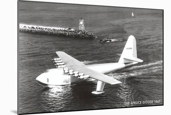 Spruce Goose Landing on the Water-null-Mounted Art Print