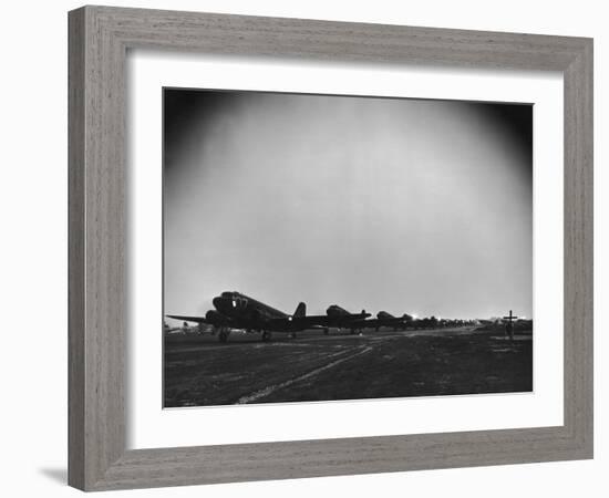 Squadron of C-47 Cargo Transports Preparing for an Evening Take Off During WWII-null-Framed Photographic Print