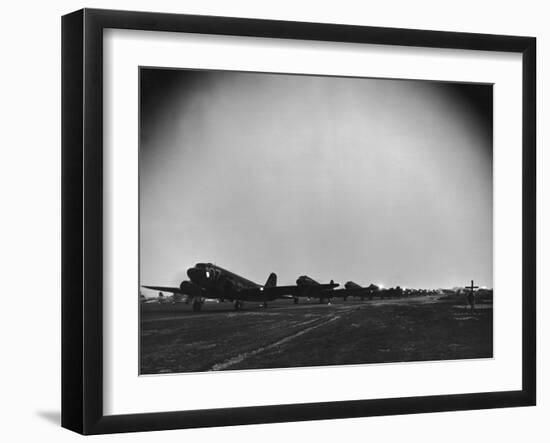 Squadron of C-47 Cargo Transports Preparing for an Evening Take Off During WWII-null-Framed Photographic Print