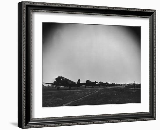 Squadron of C-47 Cargo Transports Preparing for an Evening Take Off During WWII-null-Framed Photographic Print