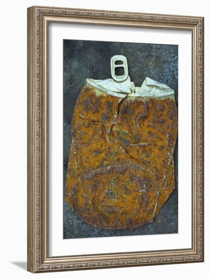 Squashed and Split Aluminium Drinks Can with Rusty Sides Lying on Tarnished Metal Sheet-Den Reader-Framed Photographic Print