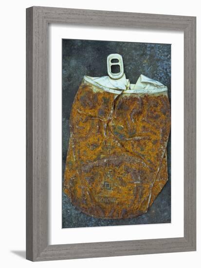 Squashed and Split Aluminium Drinks Can with Rusty Sides Lying on Tarnished Metal Sheet-Den Reader-Framed Photographic Print