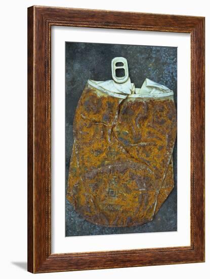 Squashed and Split Aluminium Drinks Can with Rusty Sides Lying on Tarnished Metal Sheet-Den Reader-Framed Photographic Print