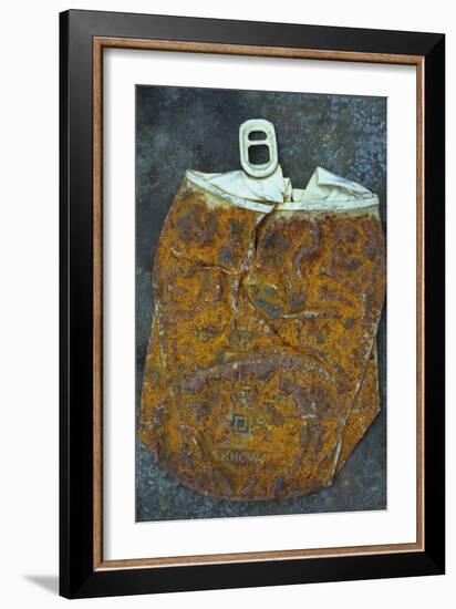 Squashed and Split Aluminium Drinks Can with Rusty Sides Lying on Tarnished Metal Sheet-Den Reader-Framed Photographic Print