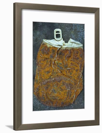 Squashed and Split Aluminium Drinks Can with Rusty Sides Lying on Tarnished Metal Sheet-Den Reader-Framed Photographic Print