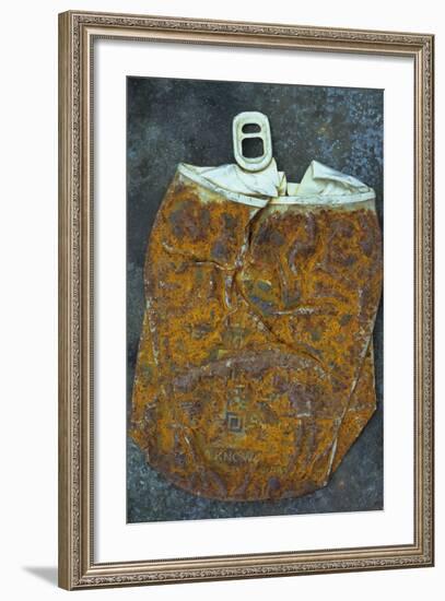 Squashed and Split Aluminium Drinks Can with Rusty Sides Lying on Tarnished Metal Sheet-Den Reader-Framed Photographic Print