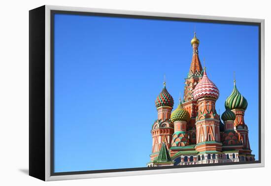 St. Basil's Cathedral on Red Square in Moscow, Russia. Copyspace at the Left.-Zoom-zoom-Framed Premier Image Canvas