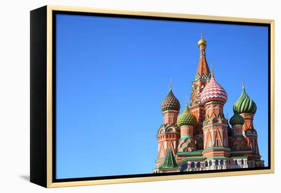 St. Basil's Cathedral on Red Square in Moscow, Russia. Copyspace at the Left.-Zoom-zoom-Framed Premier Image Canvas