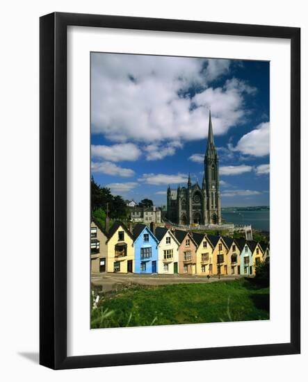 St. Coleman's Cathedral of Cobh Behind Colorful Row Houses-Charles O'Rear-Framed Photographic Print