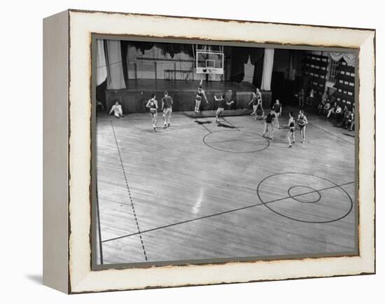 St. John's Basketball Team Members Practicing While their Coach Looks On-Ralph Morse-Framed Premier Image Canvas