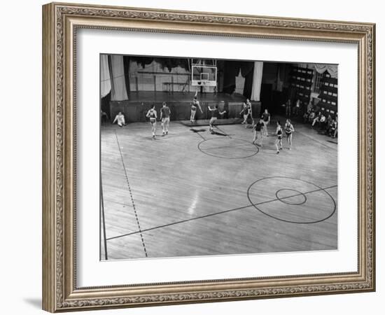 St. John's Basketball Team Members Practicing While their Coach Looks On-Ralph Morse-Framed Photographic Print