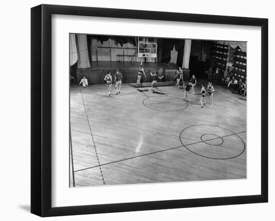 St. John's Basketball Team Members Practicing While their Coach Looks On-Ralph Morse-Framed Photographic Print