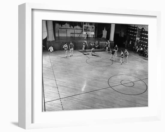 St. John's Basketball Team Members Practicing While their Coach Looks On-Ralph Morse-Framed Photographic Print