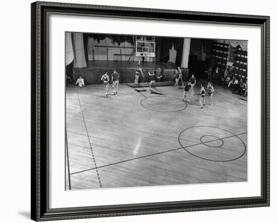 St. John's Basketball Team Members Practicing While their Coach Looks On-Ralph Morse-Framed Photographic Print