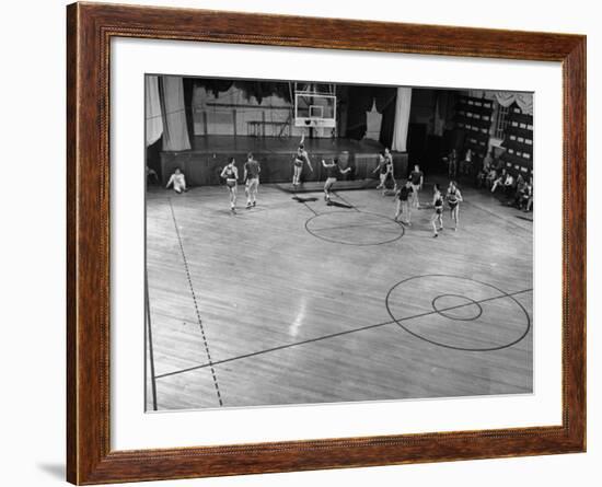 St. John's Basketball Team Members Practicing While their Coach Looks On-Ralph Morse-Framed Photographic Print