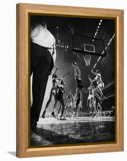 St. John's Defeating Bradley in a Basketball Game at Madison Square Garden-Gjon Mili-Framed Premier Image Canvas