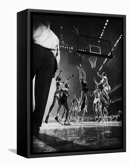 St. John's Defeating Bradley in a Basketball Game at Madison Square Garden-Gjon Mili-Framed Premier Image Canvas