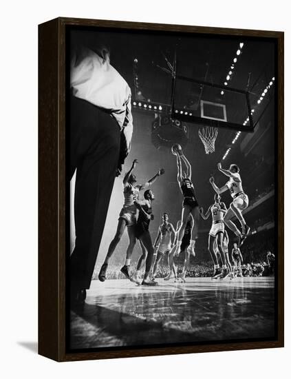 St. John's Defeating Bradley in a Basketball Game at Madison Square Garden-Gjon Mili-Framed Premier Image Canvas