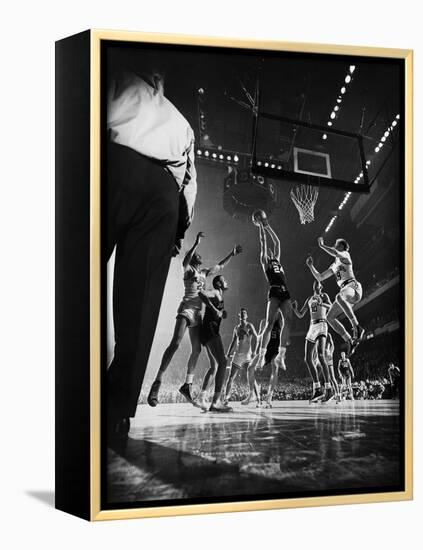 St. John's Defeating Bradley in a Basketball Game at Madison Square Garden-Gjon Mili-Framed Premier Image Canvas