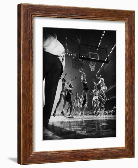 St. John's Defeating Bradley in a Basketball Game at Madison Square Garden-Gjon Mili-Framed Photographic Print