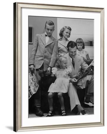 St. Louis Cardinals Player Stan Musial Reading the Newspaper with His Wife  and Children' Photographic Print